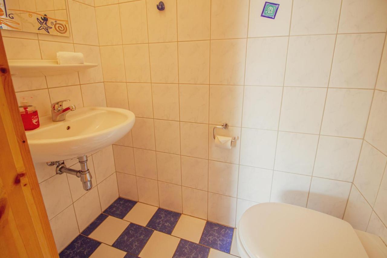 Haus Leuchtturm - Ebbe Apartment ครุมเฮิร์น ภายนอก รูปภาพ